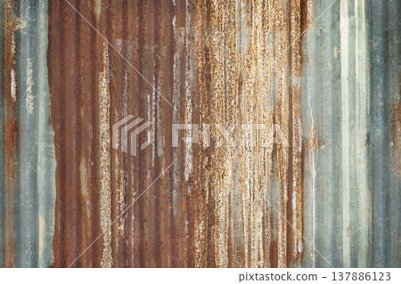 Old zinc wall texture background, rusty on galvanized metal panel sheeting. Old zinc wall texture background, rusty on galvanized metal panel sheeting. 137886123