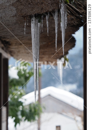 Icicles on a house in Miyama Icicles on a house in Miyama 137886129