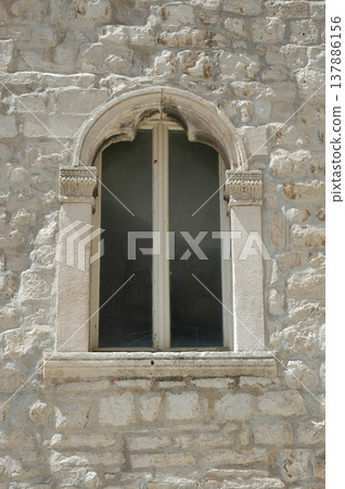 Gothic Bifora Window on a Stone House in Korcula Gothic Bifora Window on a Stone House in Korcula 137886156