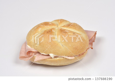 Ham Sandwich in a Kaiser Roll on a White Background Ham Sandwich in a Kaiser Roll on a White Background 137886190