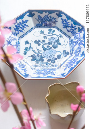 Japanese-style image [Japanese tableware and plum branches] 137886451