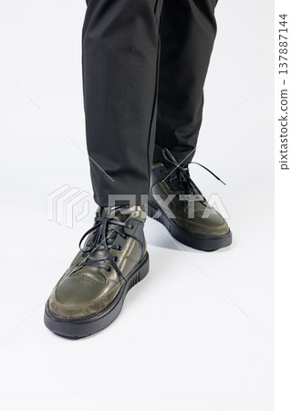 New stylish men's autumn boots made of genuine leather, men's footwear on a white background. Winter men's shoes 2022 New stylish men's autumn boots made of genuine leather, men's footwear on a white background. Winter men's shoes 2022 137887144