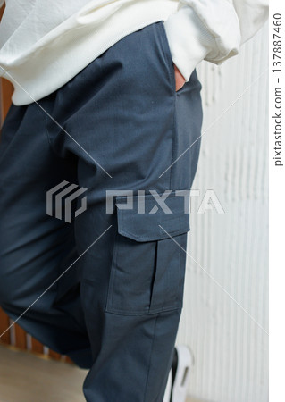 Men's casual sports pants with pockets. Lightweight summer pants for men. Men's casual sports pants with pockets. Lightweight summer pants for men. 137887460