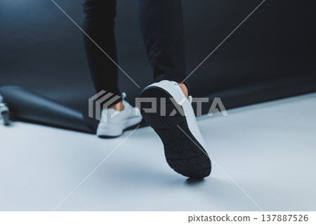 Men's casual white shoes made of genuine leather, men on shoes in white sneakers. High quality photo Men's casual white shoes made of genuine leather, men on shoes in white sneakers. High quality photo 137887526
