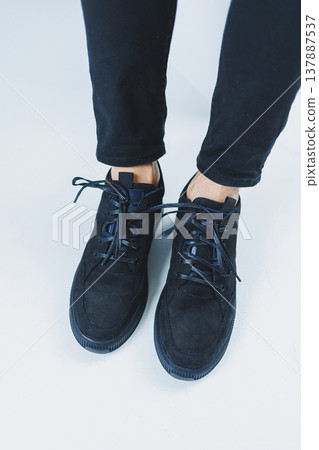 Men's casual shoes in black color made of genuine leather, men on shoes in black lace shoes. High quality photo Men's casual shoes in black color made of genuine leather, men on shoes in black lace shoes. High quality photo 137887537