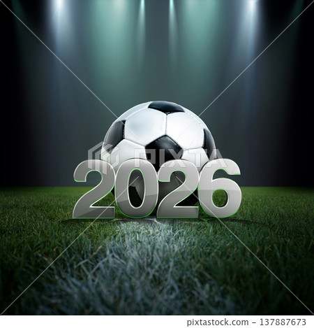 Soccer ball with 2026 placed exactly on the white line on green grass soccer field, close-up view. Soccer ball with 2026 placed exactly on the white line on green grass soccer field, close-up view. 137887673