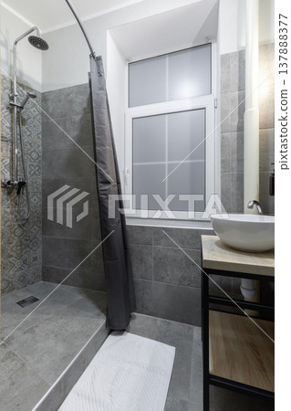 Modern Hostel Bathroom with Shower Stall, Window, and Vessel Sink Modern Hostel Bathroom with Shower Stall, Window, and Vessel Sink 137888377