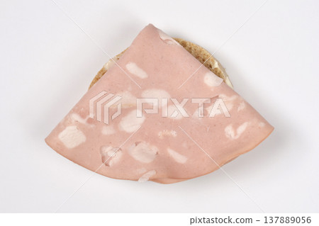 Single Mortadella Slice on Bread Roll 137889056