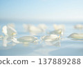 wedding rings on the sea shore 137889288