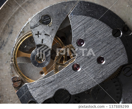 old clockwork, metal gears close up old clockwork, metal gears close up 137889299