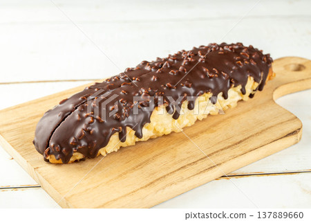 Chocolate-covered bread roll Chocolate-covered bread roll 137889660
