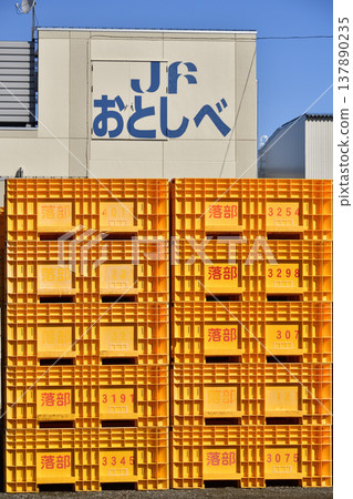 A photograph of fish boxes at Otobe Fishing Port in Yakumo Town, Hokkaido, in spring. A photograph of fish boxes at Otobe Fishing Port in Yakumo Town, Hokkaido, in spring. 137890235