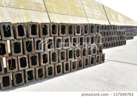 A photograph of octopus boxes drying at Otobe Fishing Port in Yakumo Town, Hokkaido, in spring. A photograph of octopus boxes drying at Otobe Fishing Port in Yakumo Town, Hokkaido, in spring. 137890762