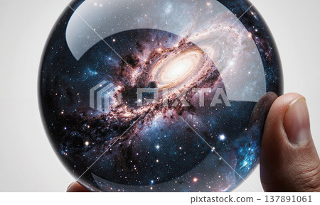 A luminous glass sphere encasing a swirling galaxy, symbolizing the universe within, limitless imagination, and the power of perspective. 137891061