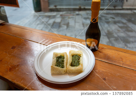 Genoa, Italy: Local snack - Genoa pesto focaccia Genoa, Italy: Local snack - Genoa pesto focaccia 137892085