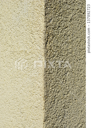 Light and Shadow on Textured Stucco Wall Corner Light and Shadow on Textured Stucco Wall Corner 137892723