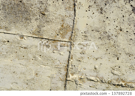 Weathered Concrete Wall with Deep Grooves Weathered Concrete Wall with Deep Grooves 137892728