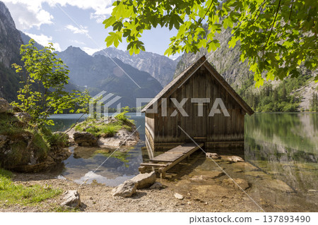 Small boathouse at lake Obersee, lake Konigssee, in the Berchtesgaden Alps, Bavaria, Germany Small boathouse at lake Obersee, lake Konigssee, in the Berchtesgaden Alps, Bavaria, Germany 137893490