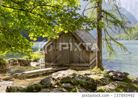 Small boathouse at lake Obersee, lake Konigssee, in the Berchtesgaden Alps, Bavaria, Germany Small boathouse at lake Obersee, lake Konigssee, in the Berchtesgaden Alps, Bavaria, Germany 137893492