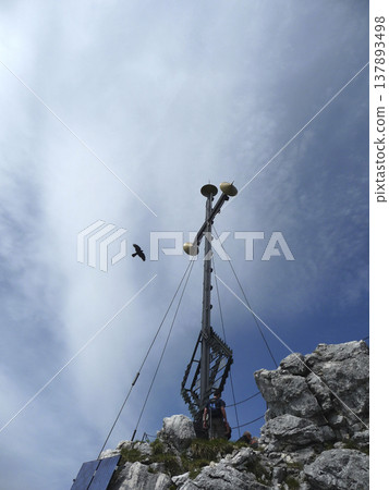 Summit cross of Kampenwand mountain tour in Bavaria, Germany Summit cross of Kampenwand mountain tour in Bavaria, Germany 137893498