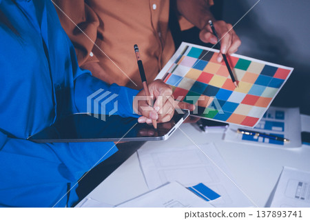 UXUI design brainstorming session with sketches and digital tools UXUI design brainstorming session with sketches and digital tools 137893741