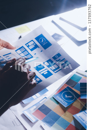 UXUI design brainstorming session with sketches and digital tools 137893762