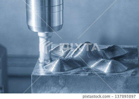 High-efficiency rough cutting process on mold parts using a CNC milling machine with an indexable insert tool. High-efficiency rough cutting process on mold parts using a CNC milling machine with an indexable insert tool. 137893897