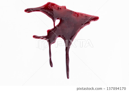 A blood spatter. A blood flowing down. Bloody pattern. Concepts of blood can be used in design. An image of dark crimson blood oozing and dripping down a stark white background. A blood spatter. A blood flowing down. Bloody pattern. Concepts of blood can be used in design. An image of dark crimson blood oozing and dripping down a stark white background. 137894170