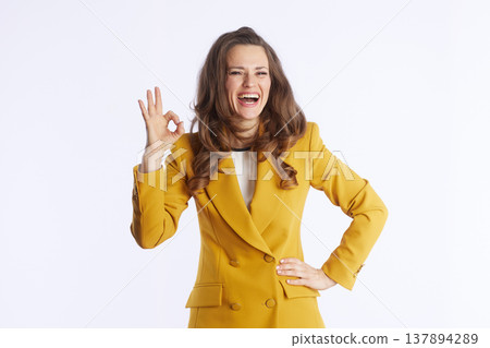 Confident Businesswoman Signals Approval 137894289