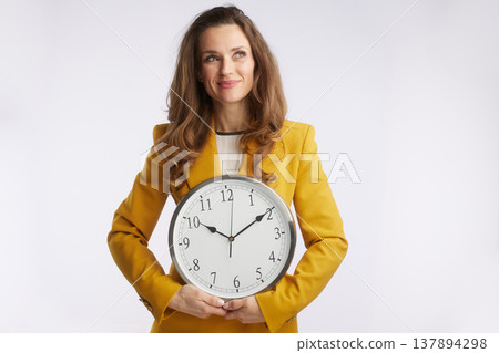 Focused Businesswoman Contemplating Time 137894298