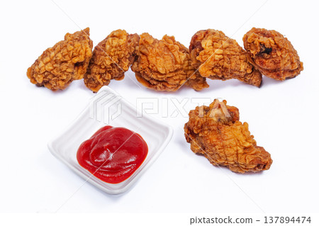 Row Of Fried Chicken Pieces Ketchup Dip Lined Texturerich Bites Communal Platter Suggestion, Crunchy Row Of Fried Chicken Pieces Ketchup Dip Lined Texturerich Bites Communal Platter Suggestion, Crunchy 137894474