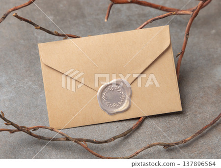 Blank sealed envelope mockup on grey stone with dry branches, copy space. Rustic stationery template Blank sealed envelope mockup on grey stone with dry branches, copy space. Rustic stationery template 137896564