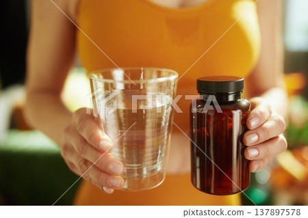 Morning Wellness Routine with Supplements and Hydration Morning Wellness Routine with Supplements and Hydration 137897578