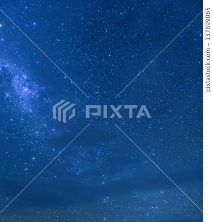 Peaceful star filled night sky with galaxy over Uyuni Bolivia 137899065