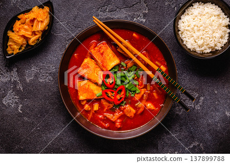 Korean traditional food, spicy kimchi soup (kimchi tige) with pork and tofu cheese. 137899788