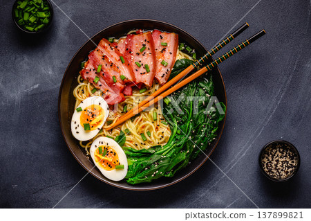 Traditional ramen noodle soup with brisket, spinach and egg. 137899821