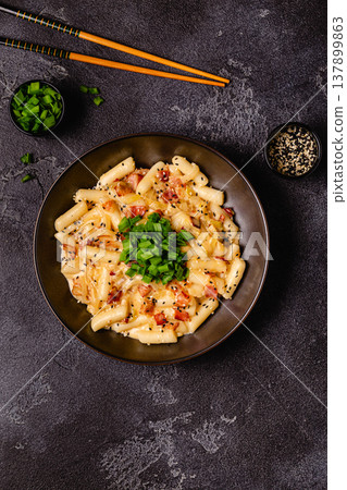 Spicy Rice Cake with Cheese and Bacon or Cream Teokbokki, Tteokbokki. 137899863
