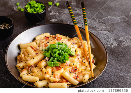 Spicy Rice Cake with Cheese and Bacon or Cream Teokbokki, Tteokbokki. 137899866