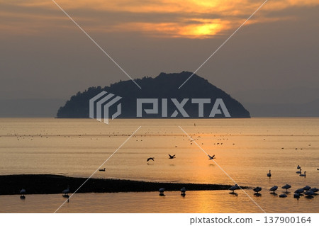 A sunset view of Lake Biwa and Chikubu Island. A sunset view of Lake Biwa and Chikubu Island. 137900164