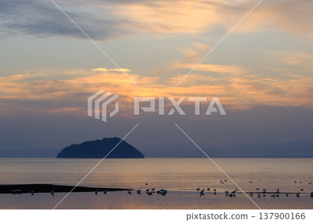 A sunset view of Lake Biwa and Chikubu Island. A sunset view of Lake Biwa and Chikubu Island. 137900166