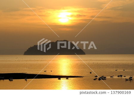 A sunset view of Lake Biwa and Chikubu Island. A sunset view of Lake Biwa and Chikubu Island. 137900169