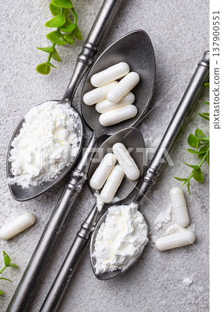 Collagen powder and pills. Healthy supplement 137900551