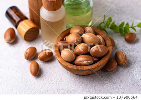 Moroccan argan seeds and oil for hair care 137900564