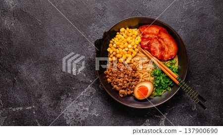A bowl of ramen with noodles, meat and green onions. A bowl of ramen with noodles, meat and green onions. 137900690