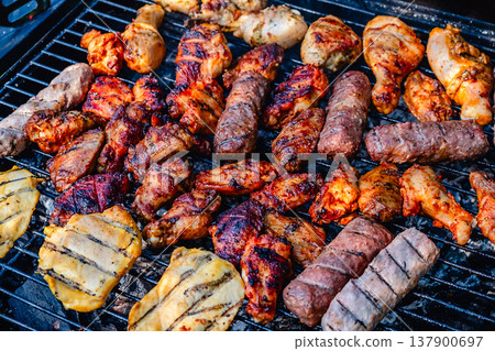 grilled meat over the coals on barbecue grilled meat over the coals on barbecue 137900697
