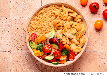 Bowl of quinoa with vegan soy meat and vegetables. Bowl of quinoa with vegan soy meat and vegetables. 137900742