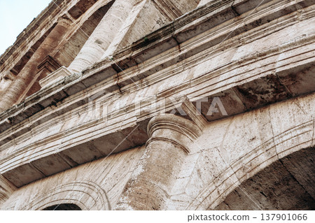 Detail of the structure showing stonework at the ancient Roman Colosseum in Italy during the day 137901066