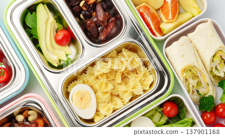 Different types of food in trays for a healthy meal plan at lunchtime 137901168
