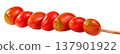 Row of fresh red grape tomatoes on a wooden skewer isolated. Healthy snack, vegetable kebab, and vegan food concept for cooking and diet. High-quality studio shot. 137901922
