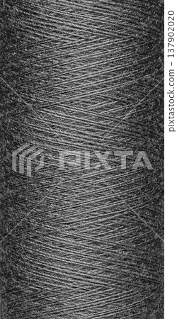 macro texture of a skein of grey sewing thread macro texture of a skein of grey sewing thread 137902020